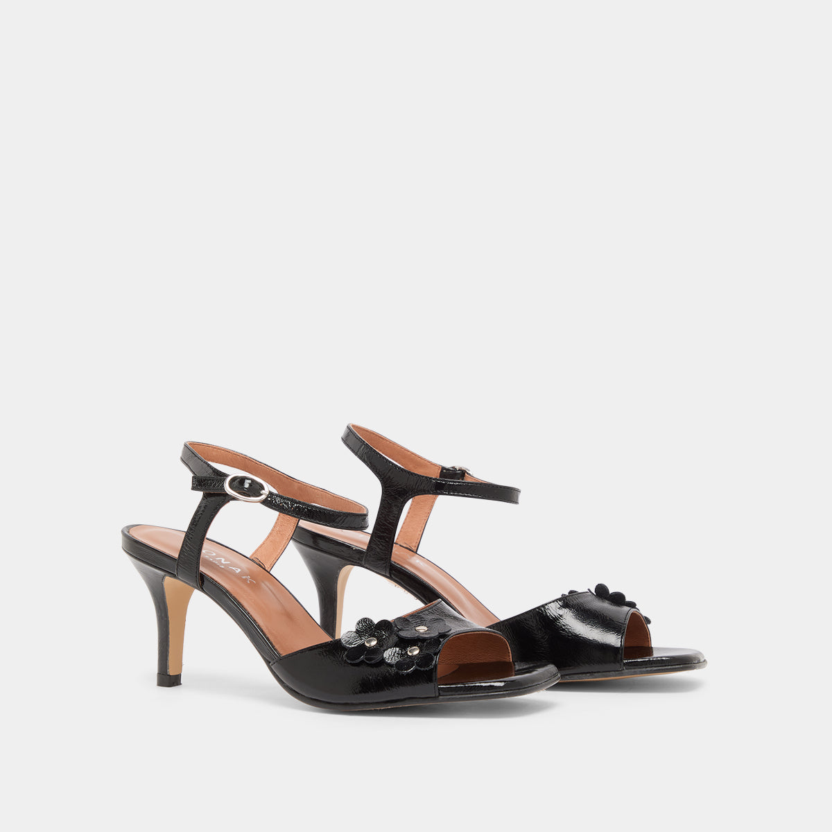 Sandales à talons et fleurs