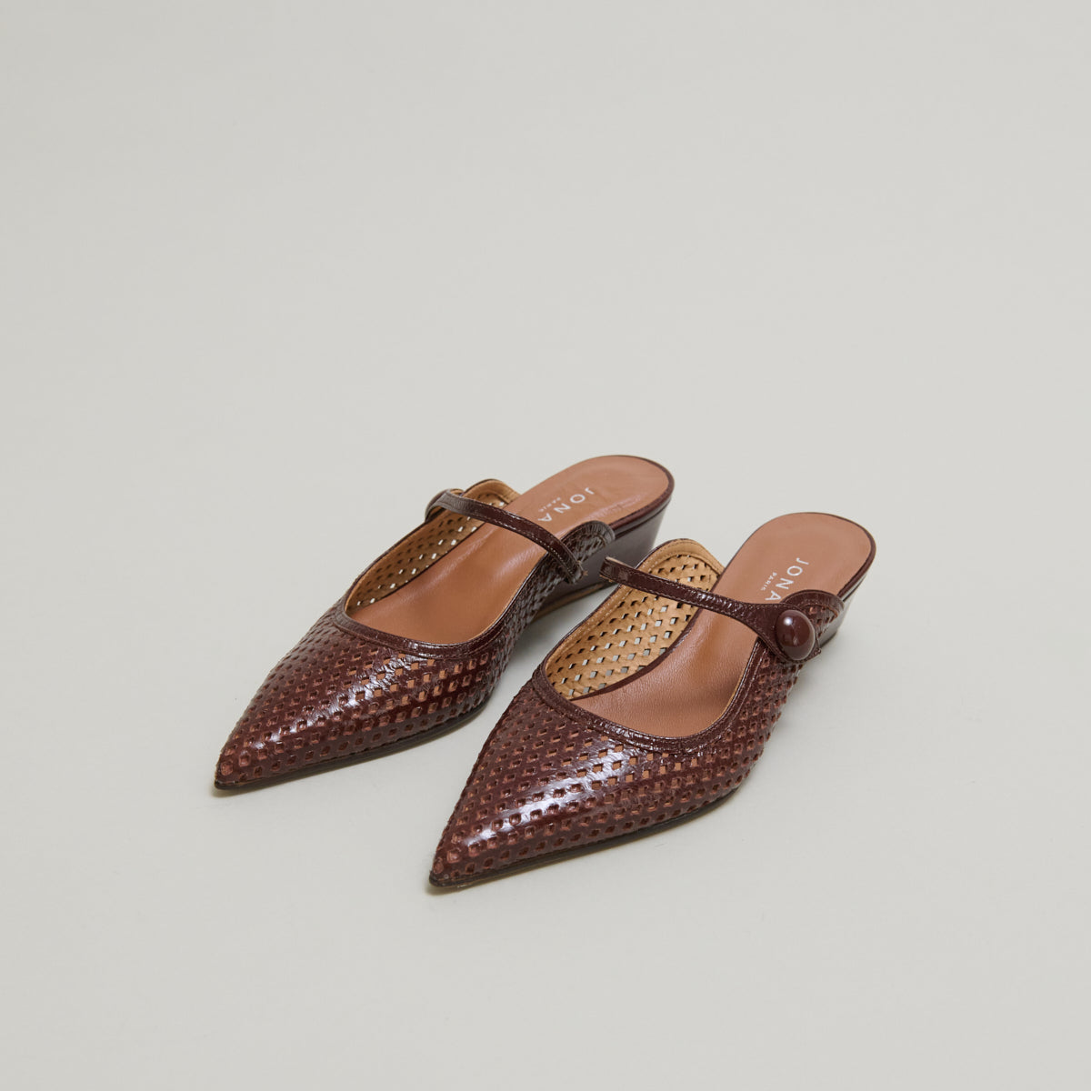 Mules compensées à bouts pointus