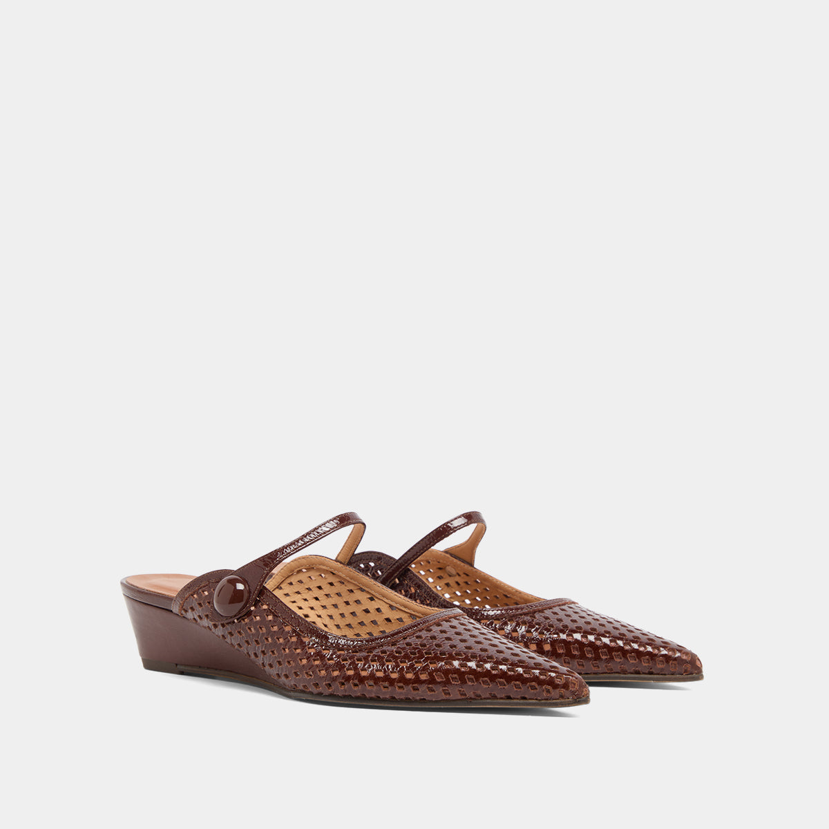 Mules compensées à bouts pointus