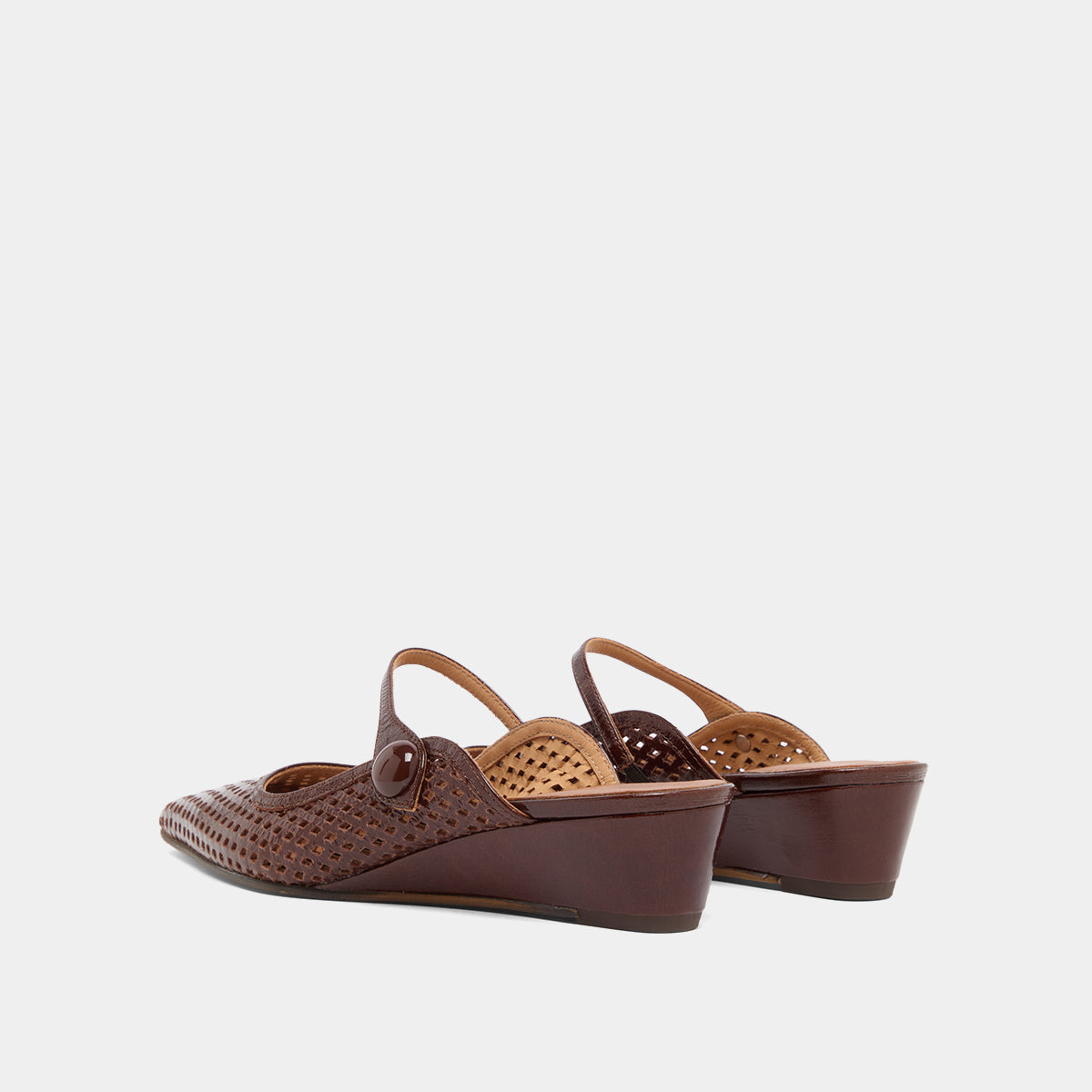Mules compensées à bouts pointus