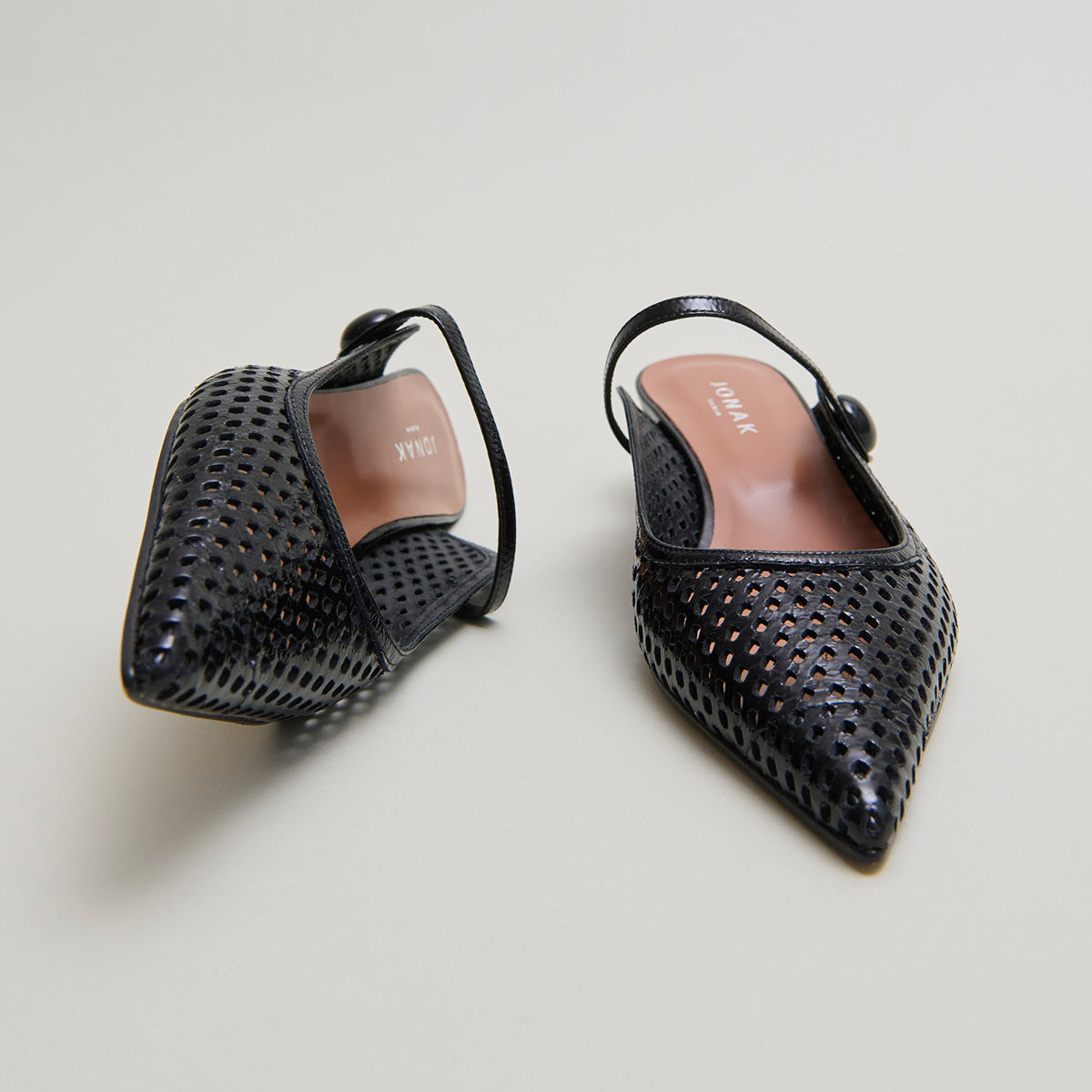 Mules compensées à bouts pointus