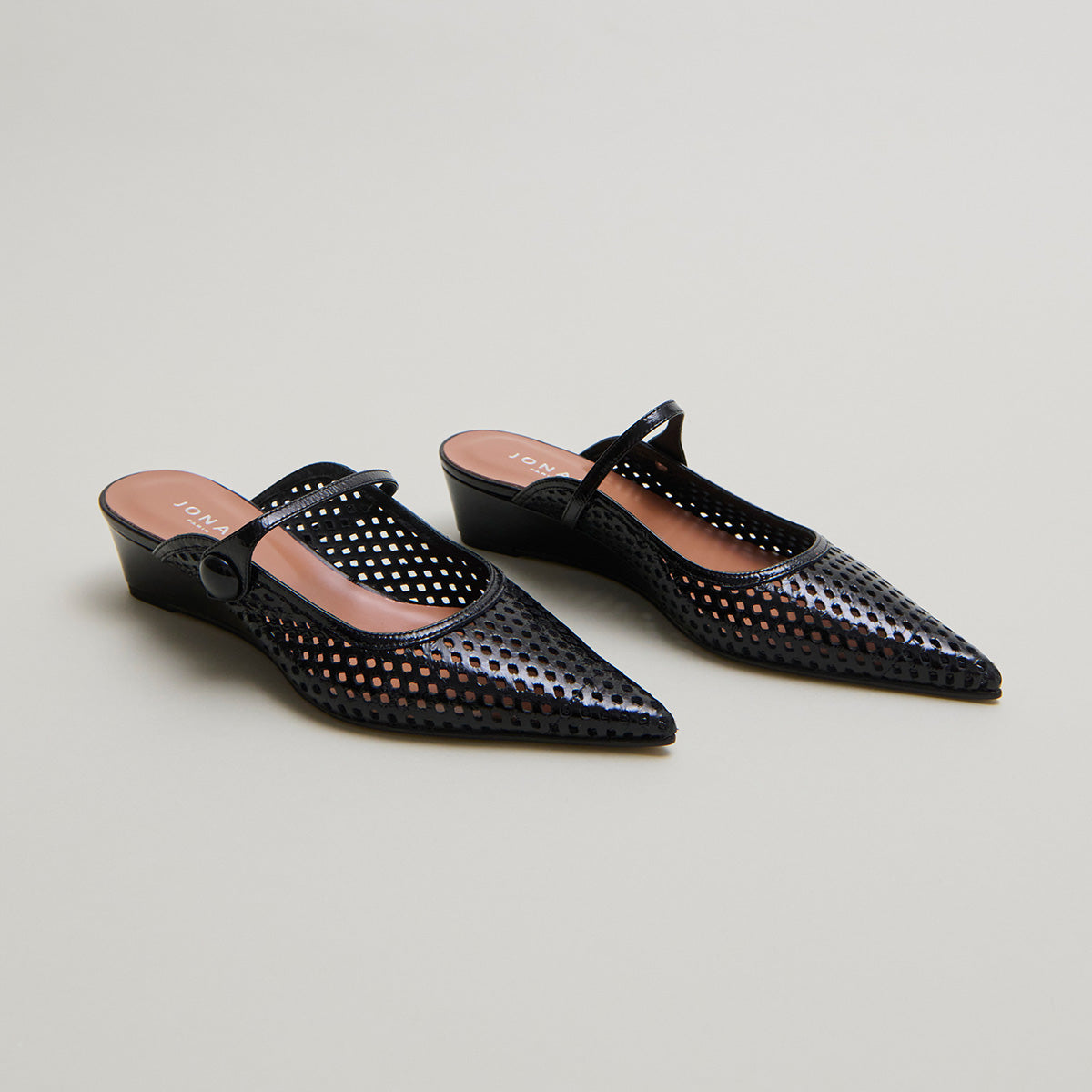 Mules compensées à bouts pointus