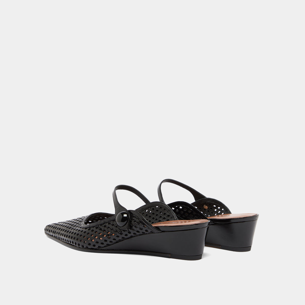 Mules compensées à bouts pointus