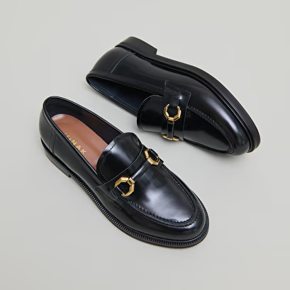 Mocassins à mors dorés