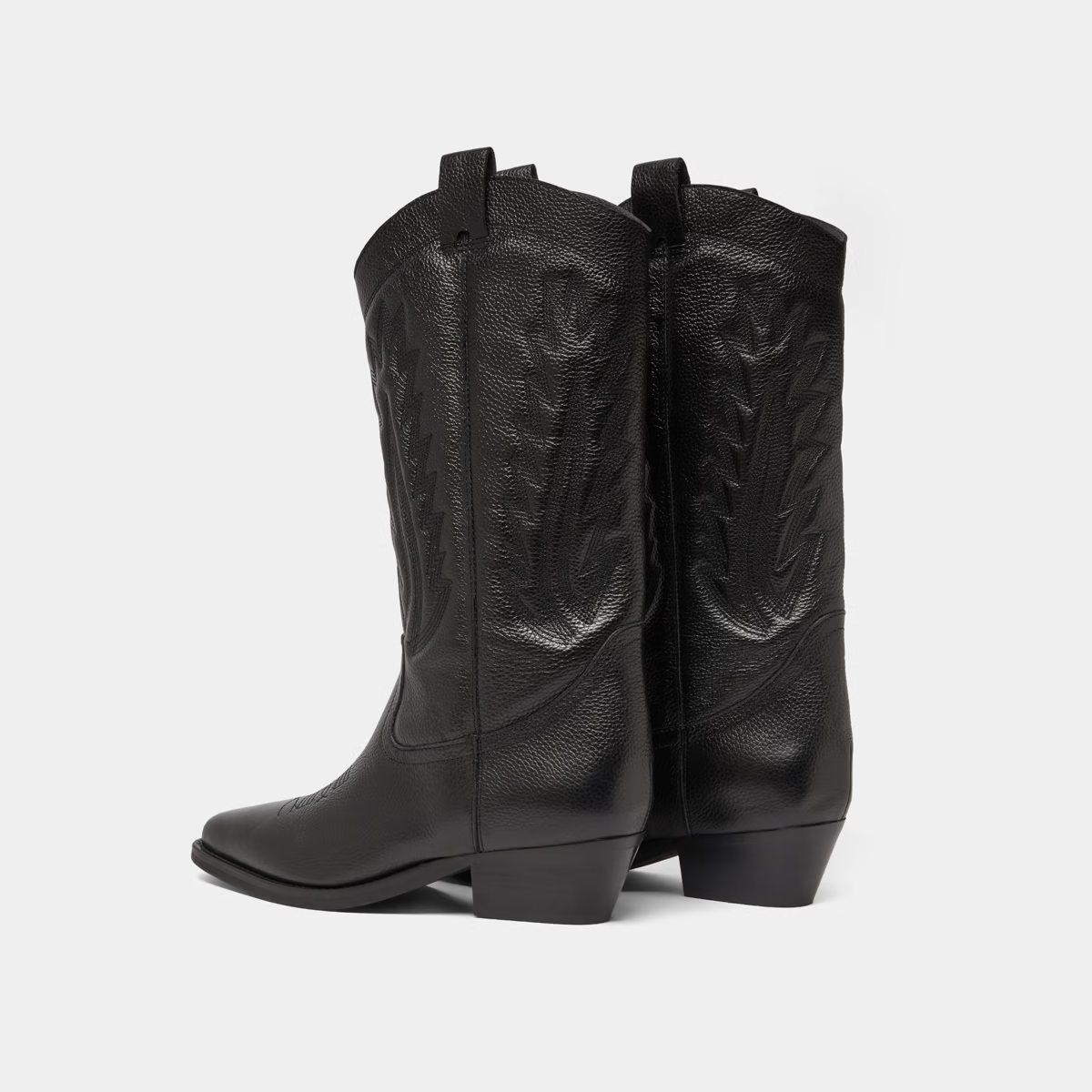 Bottes à bouts pointus et surpiqures apparentes