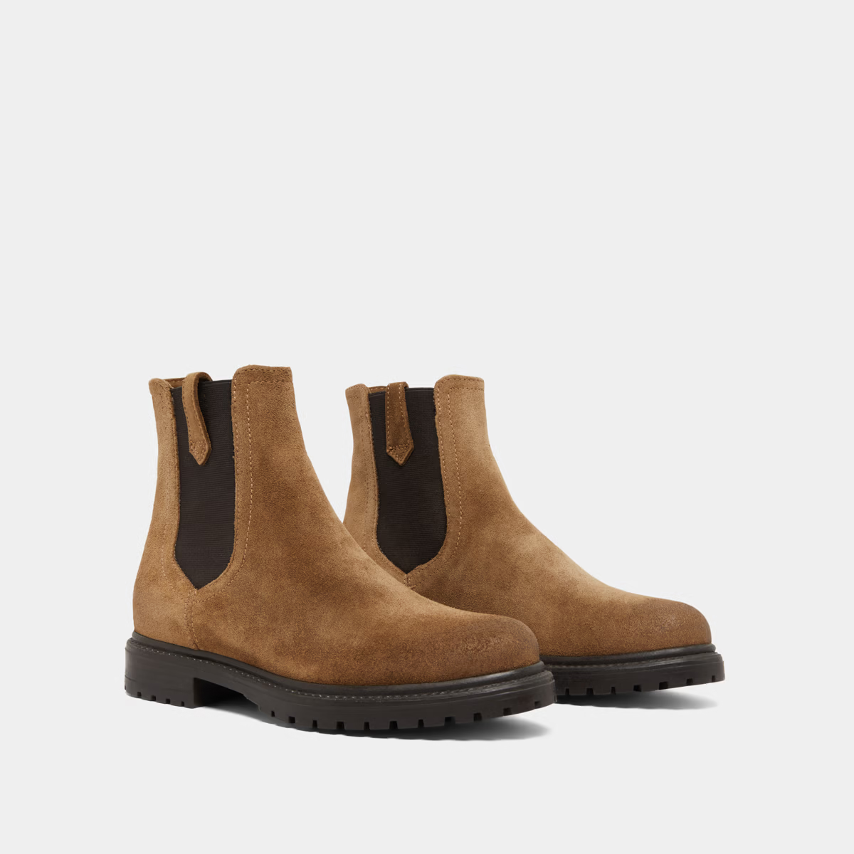 Bottines à semelles crantées et élastiques