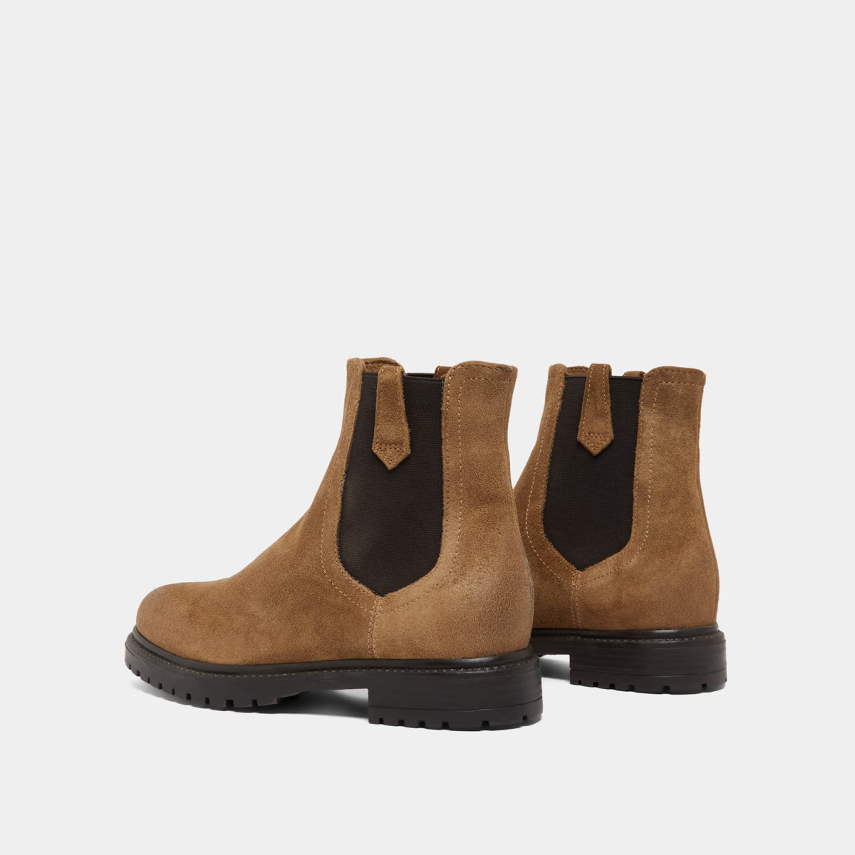 Bottines à semelles crantées et élastiques