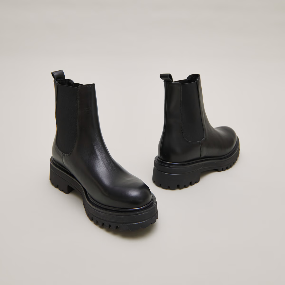 Boots à semelles crantées et élastiques