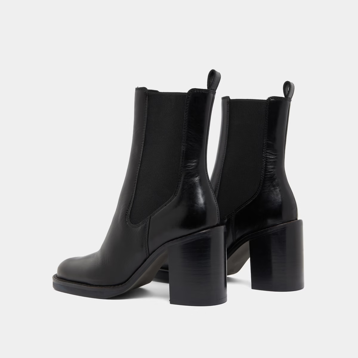 Bottines à talons débordants