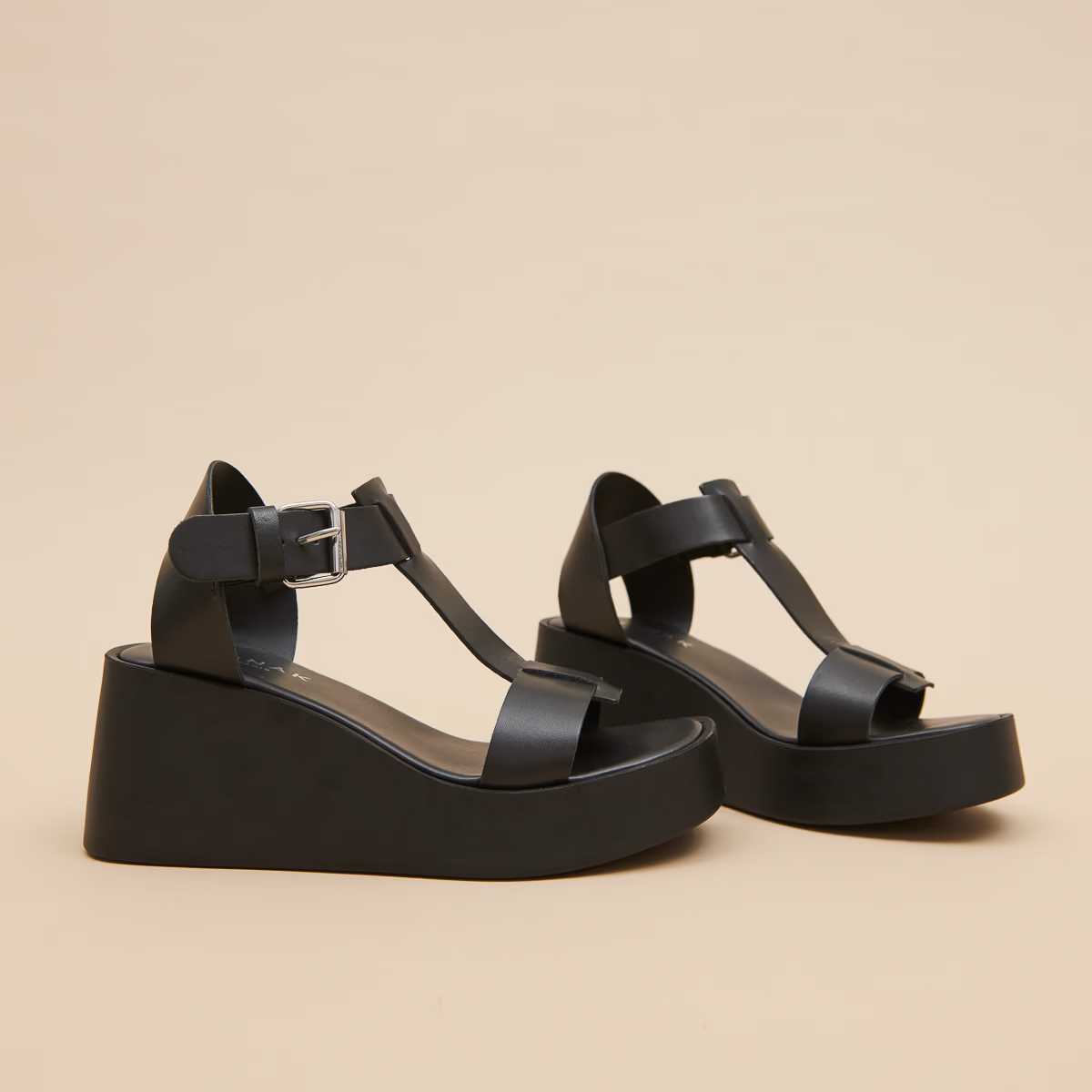 Sandales compensées à boucles ajustables