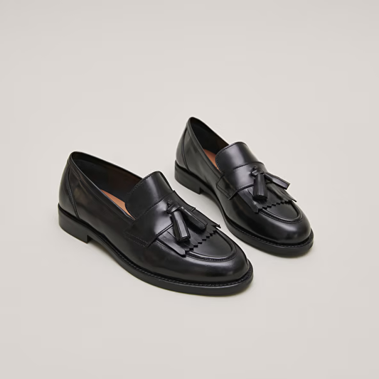 Mocassins à talons plats et pompons