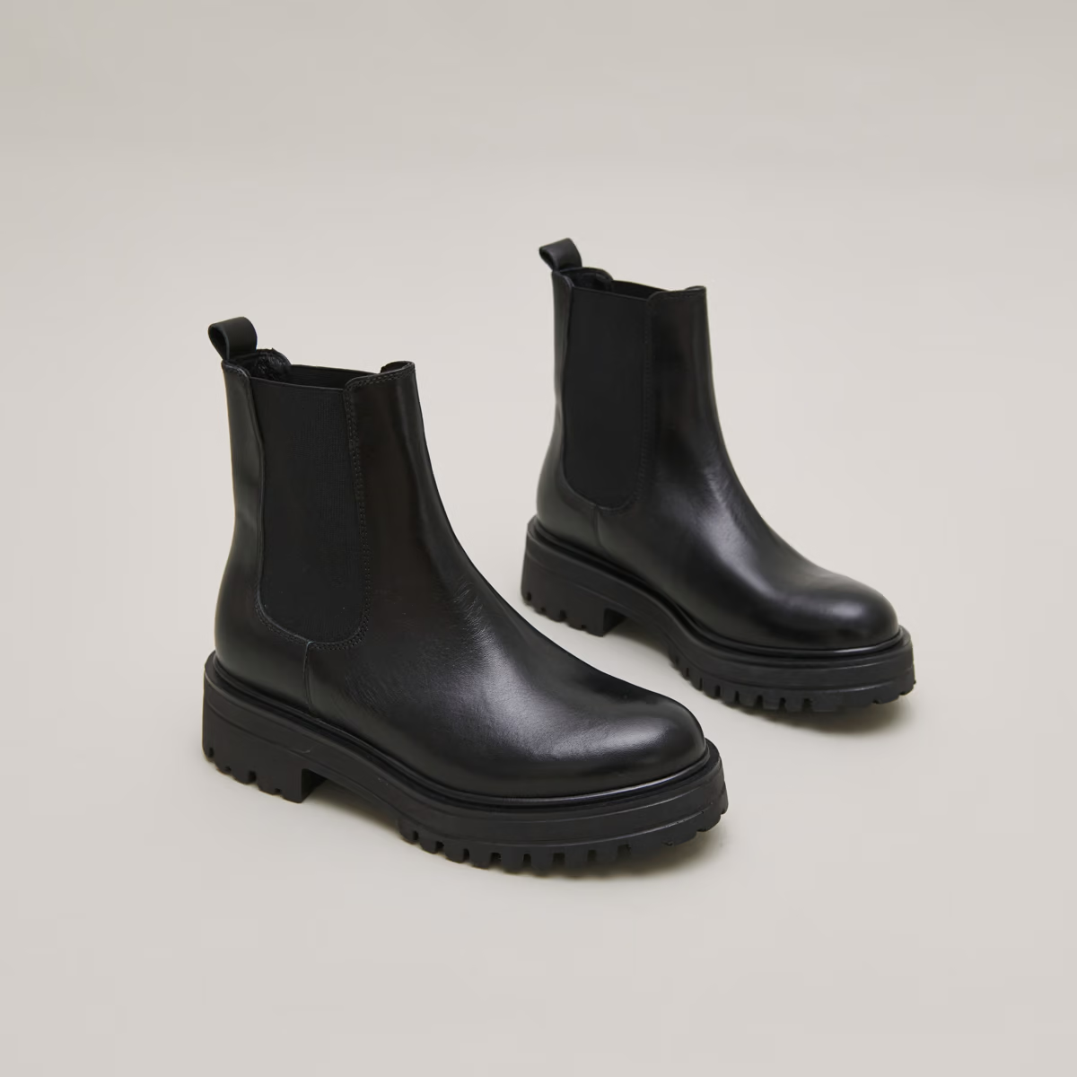 Boots à semelles crantées et élastiques