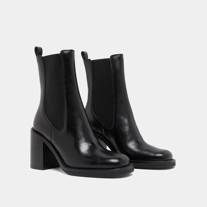 Bottines à talons débordants